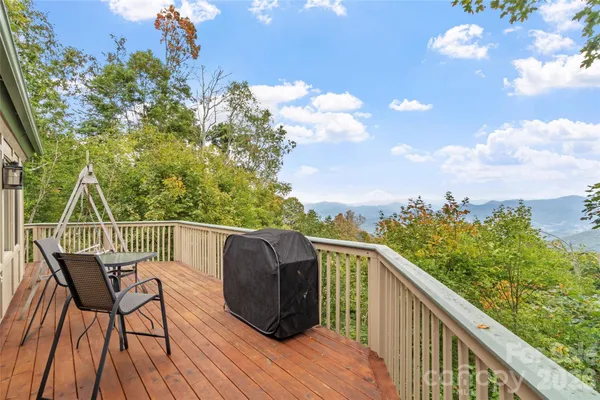 a view of balcony with furniture