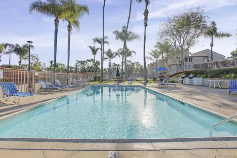 a aerial view of a house with a yard