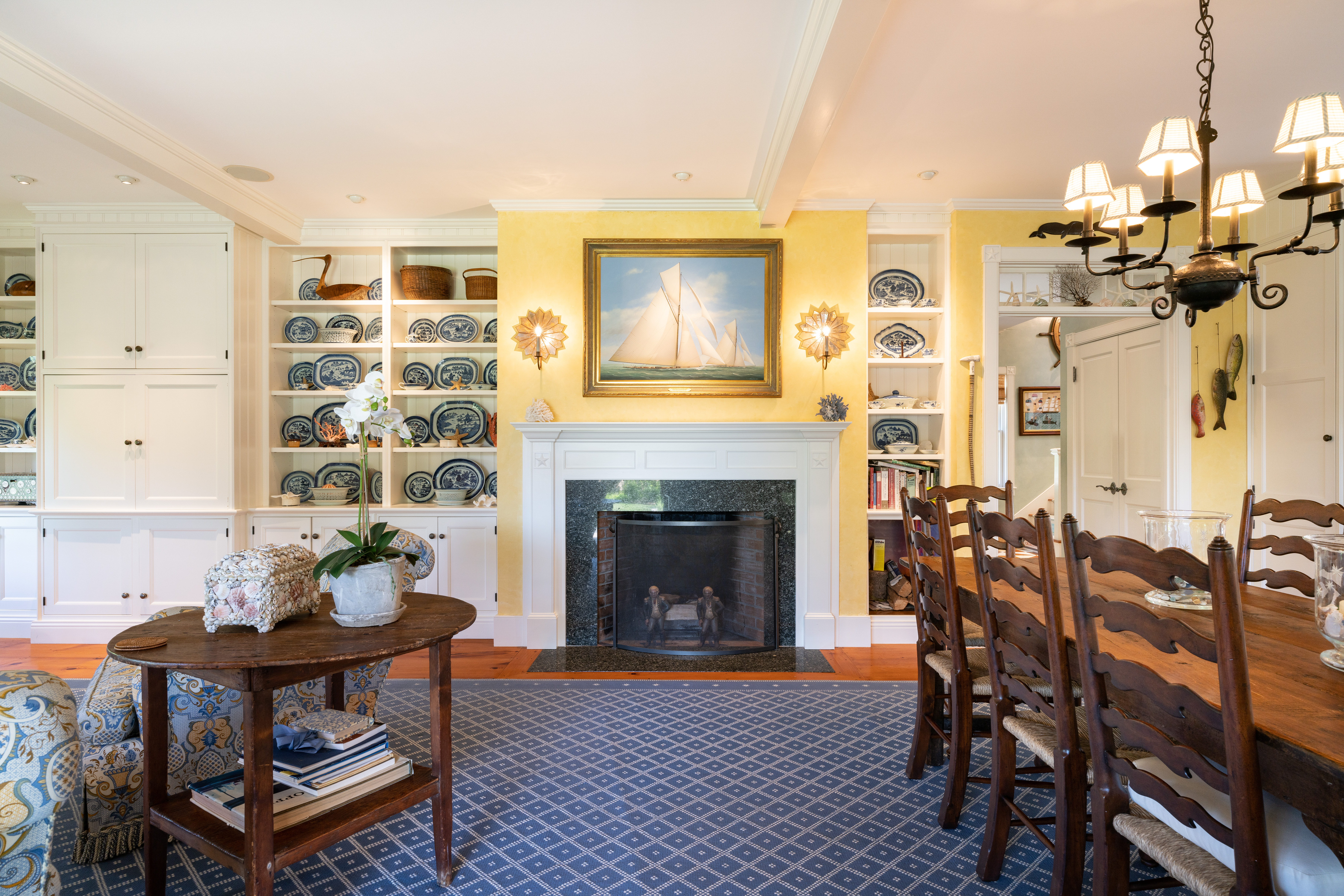 6 Ackermuck Road Nantucket, MA 02554 - Photo 12 of 40 a living room with furniture a fireplace and a table