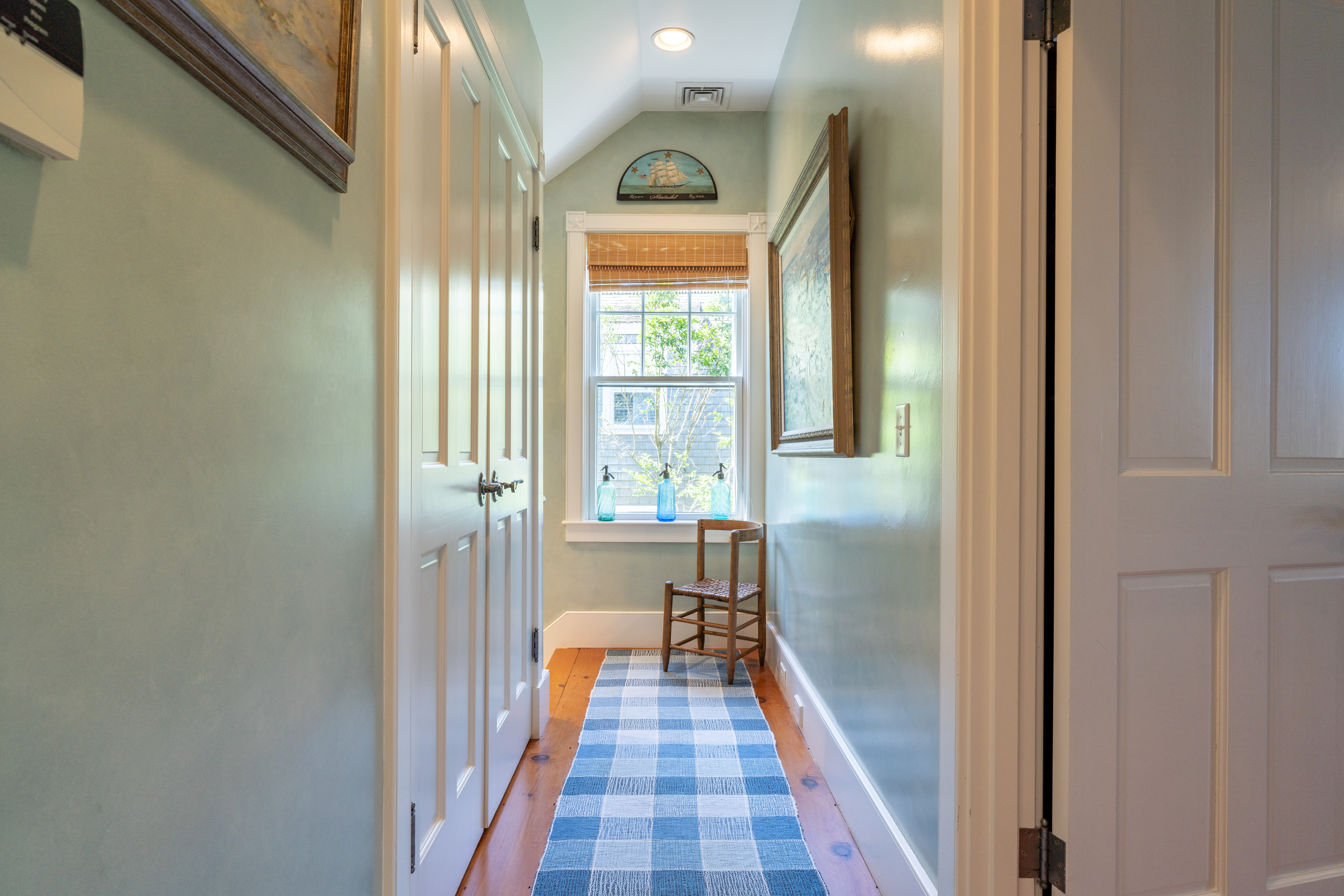 6 Ackermuck Road Nantucket, MA 02554 - Photo 18 of 40 a view of a hallway with windows