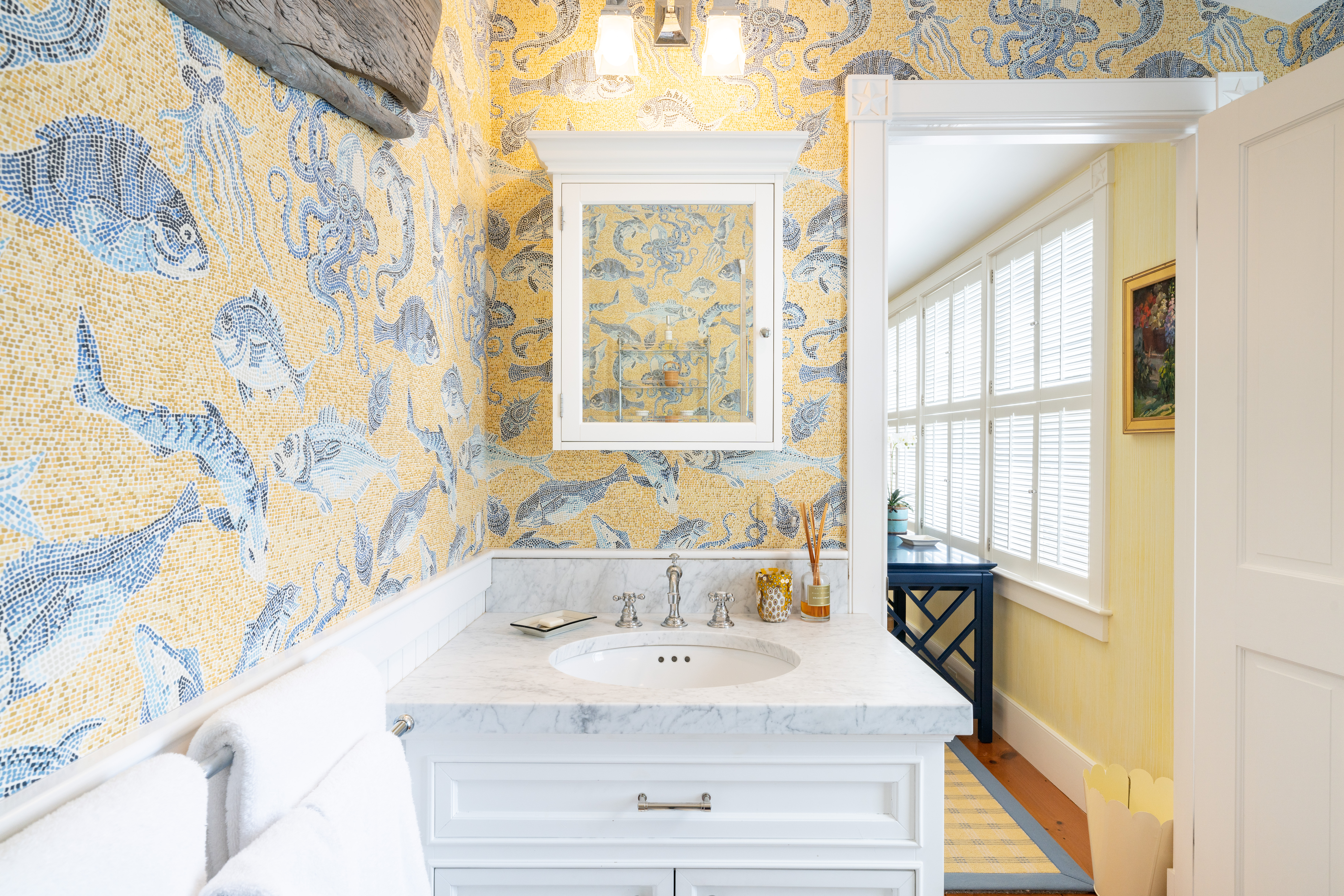 6 Ackermuck Road Nantucket, MA 02554 - Photo 24 of 40 a bathroom with a sink a bathtub and next to a window