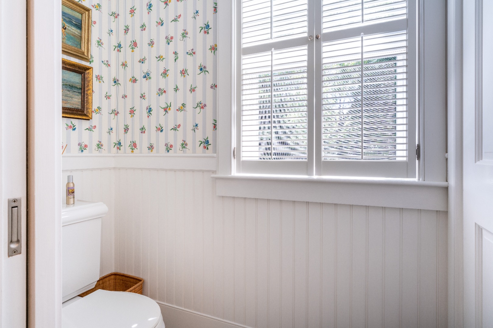 6 Ackermuck Road Nantucket, MA 02554 - Photo 30 of 40 a bathroom with a window and a shower curtain