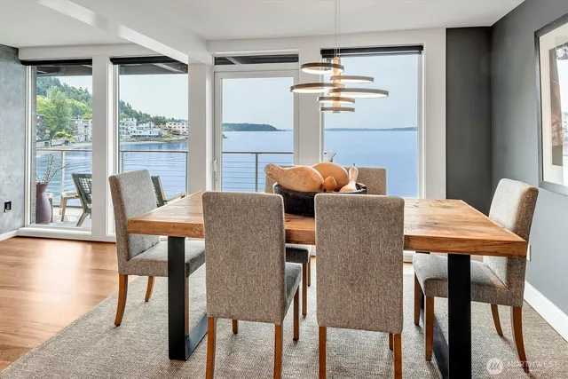a view of a dining room with furniture window and outside view