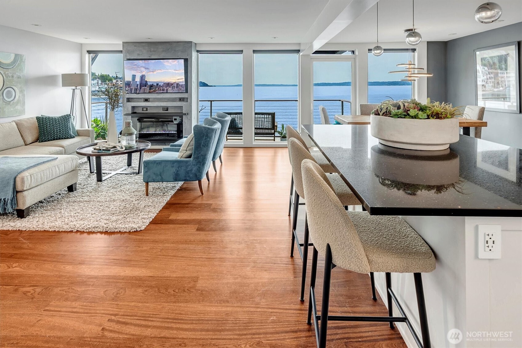 3717 Beach Drive Southwest, Unit 207 Seattle, WA 98116 - Photo 14 of 40 a living room with furniture and a fireplace