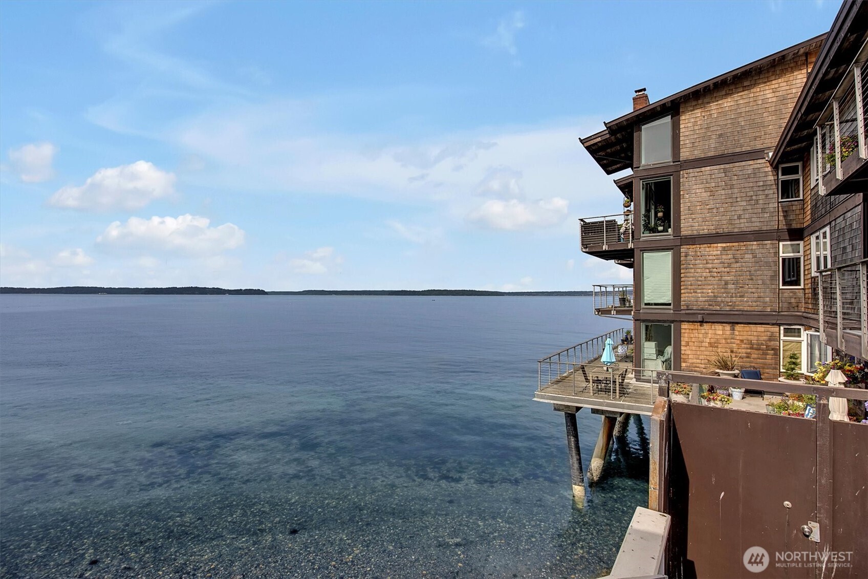 3717 Beach Drive Southwest, Unit 207 Seattle, WA 98116 - Photo 3 of 40 an outdoor space with seating