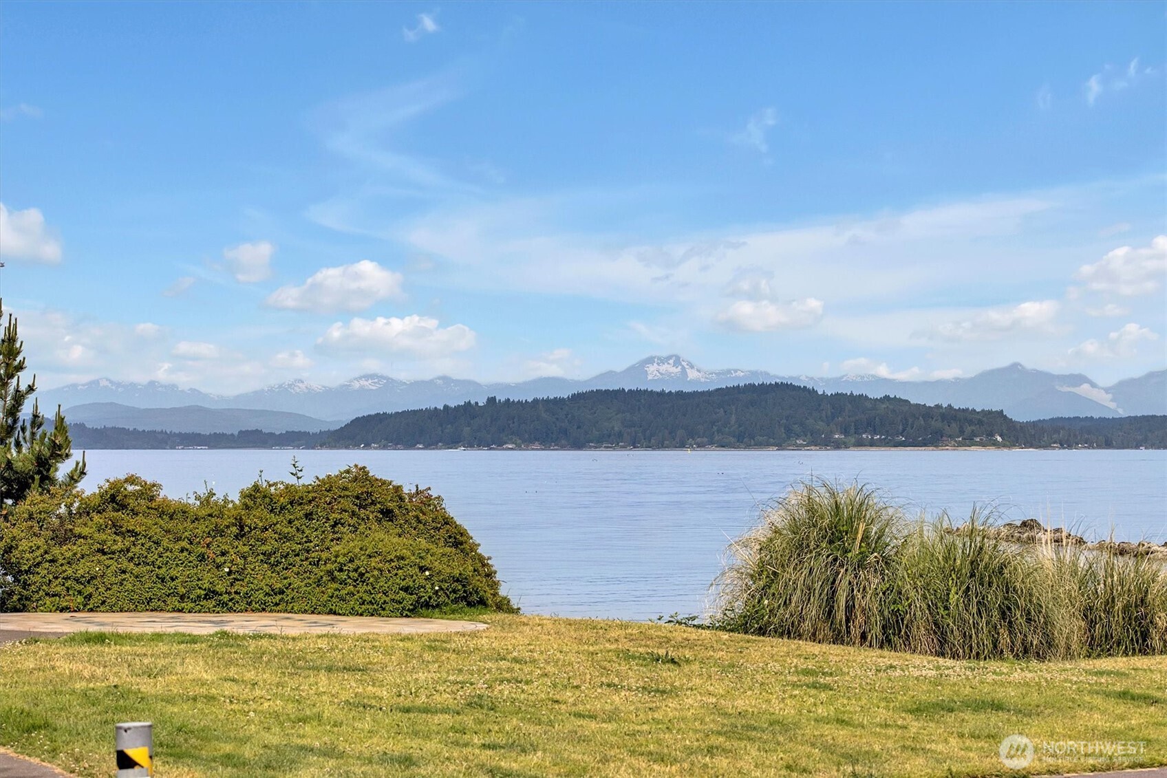 3717 Beach Drive Southwest, Unit 207 Seattle, WA 98116 - Photo 39 of 40 a view of lake with mountain