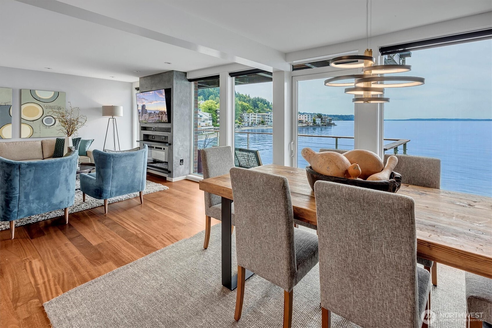 3717 Beach Drive Southwest, Unit 207 Seattle, WA 98116 - Photo 7 of 40 a living room with furniture and a wooden floor
