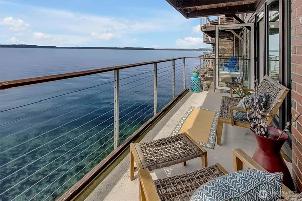 a view of balcony with furniture