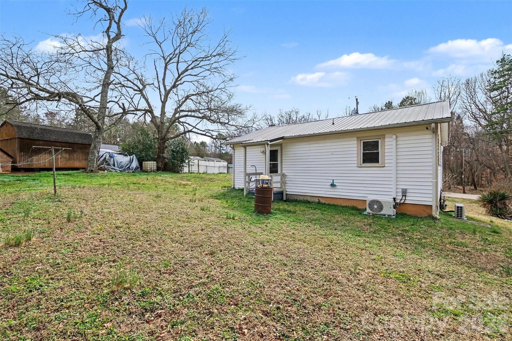 1813 Isaac Place Shelby, NC 28152 - Photo 14 of 14 a view of a backyard with a garden
