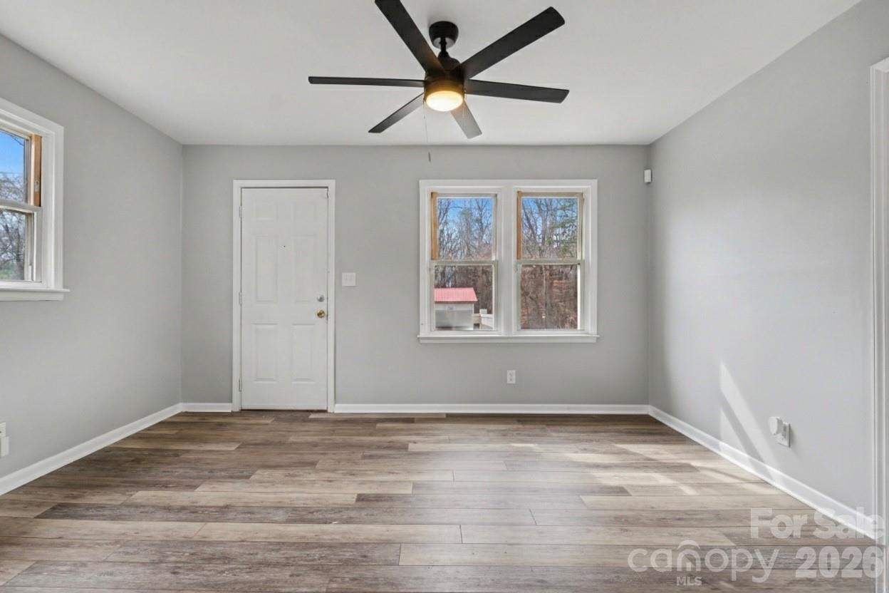 1813 Isaac Place Shelby, NC 28152 - Photo 2 of 14 a view of room with window and ceiling fan