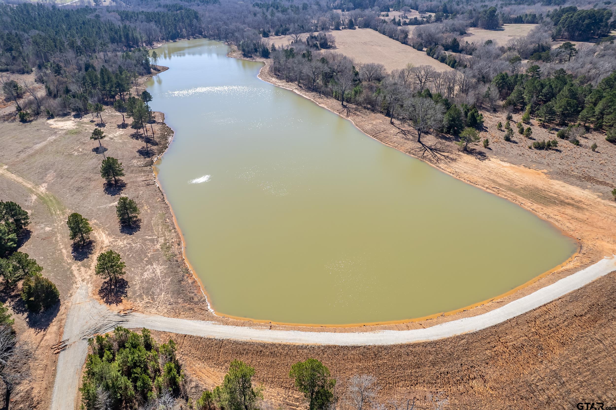 0 Fm 16 Winona, TX 75792 - Photo 5 of 19 a view of a swimming pool with a yard