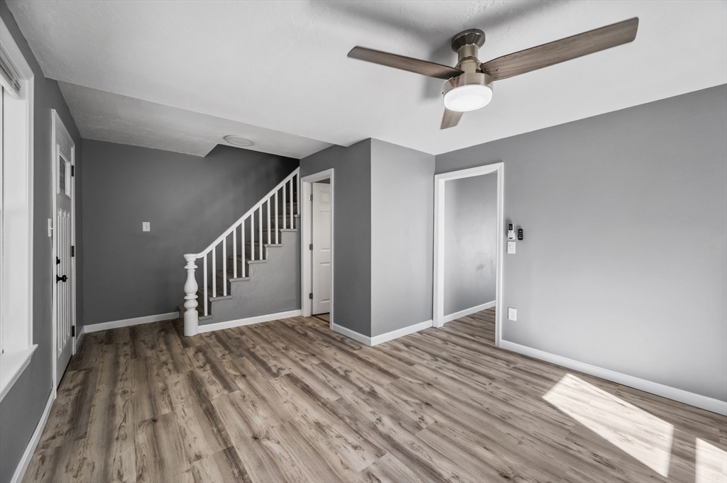 55 Mendon Street Worcester, MA 01604 - Photo 16 of 29 a view of entryway and hall with a chandelier