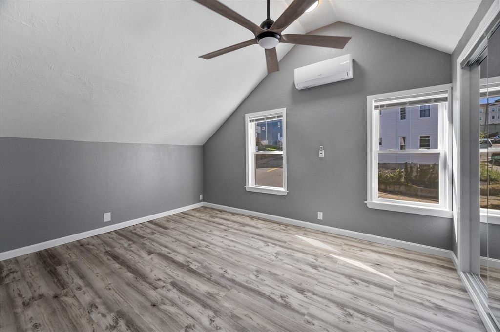 55 Mendon Street Worcester, MA 01604 - Photo 20 of 29 a view of empty room with wooden floor and fan