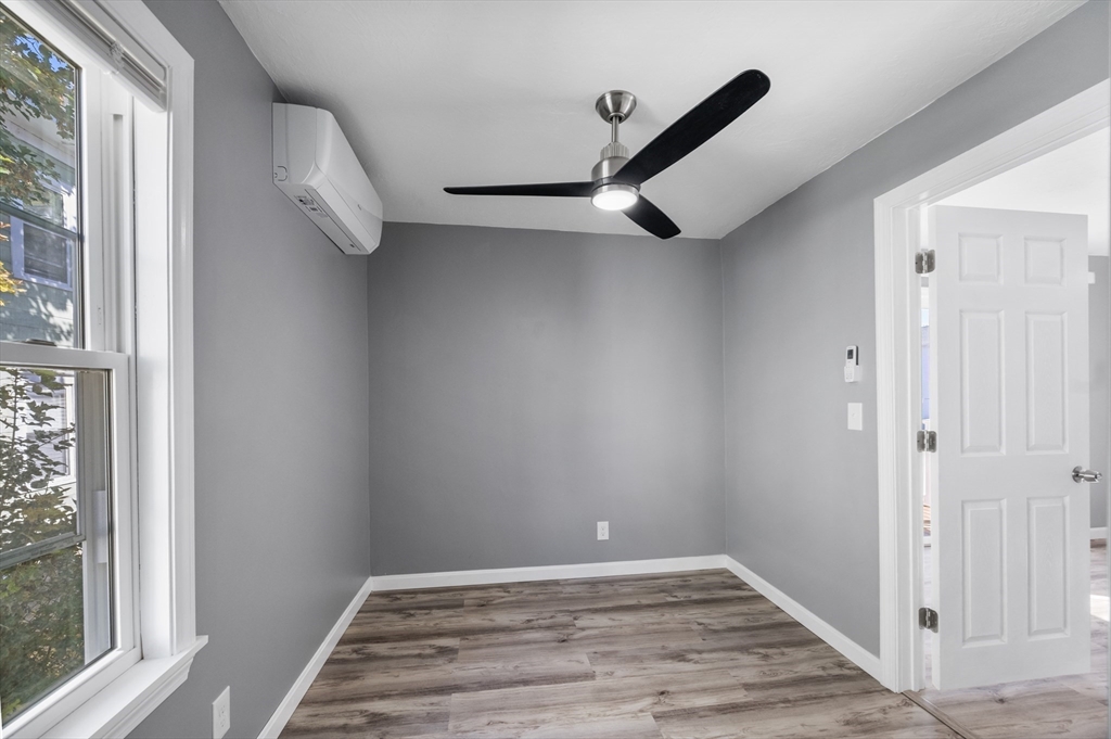 55 Mendon Street Worcester, MA 01604 - Photo 22 of 29 a view of an empty room with a window