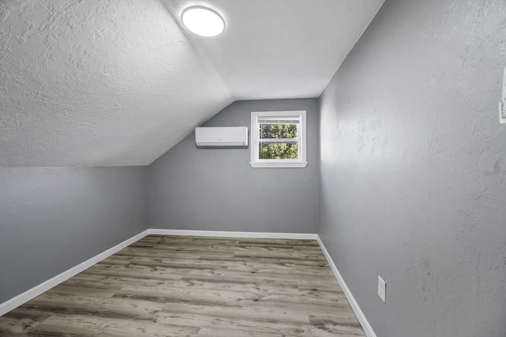 55 Mendon Street Worcester, MA 01604 - Photo 25 of 29 a view of empty room with wooden floor