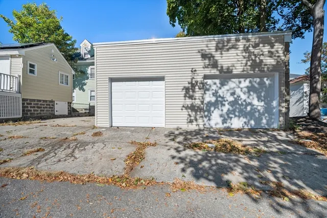 a view of a house with a snow in the background