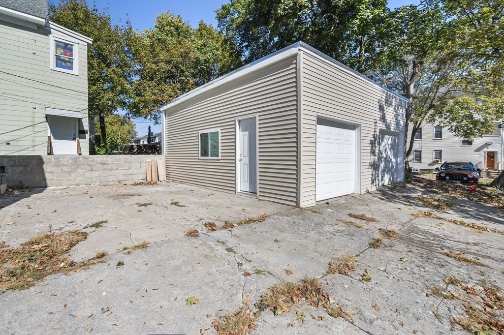 55 Mendon Street Worcester, MA 01604 - Photo 5 of 29 a view of a house with a snow on the road