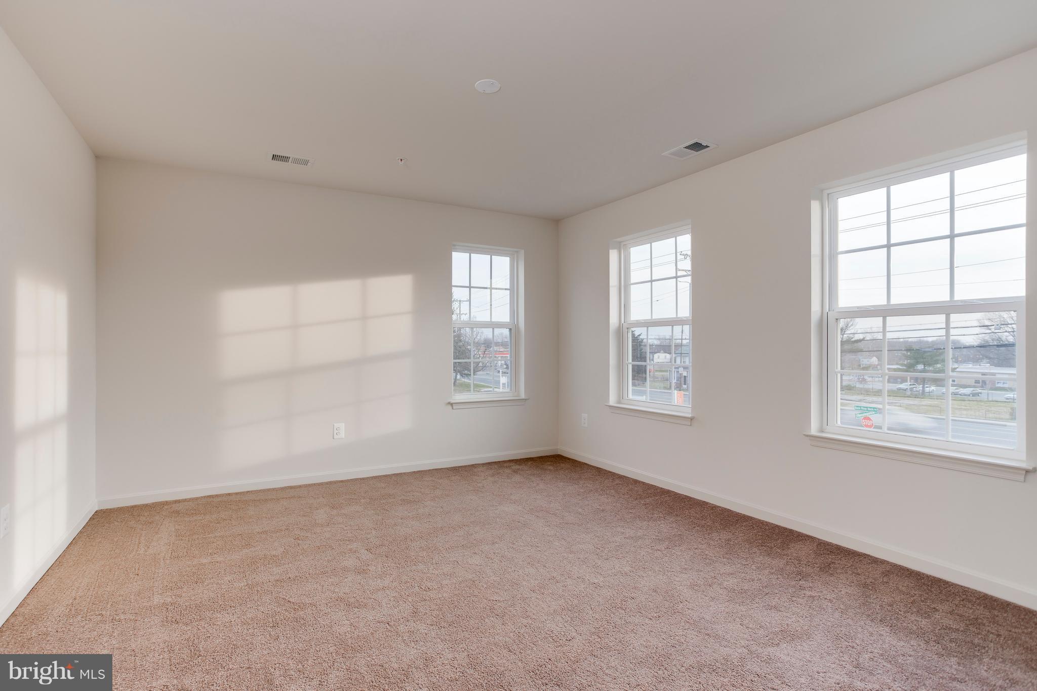 13 Back River Neck Road Baltimore, MD 21221 - Photo 12 of 30 an empty room with windows