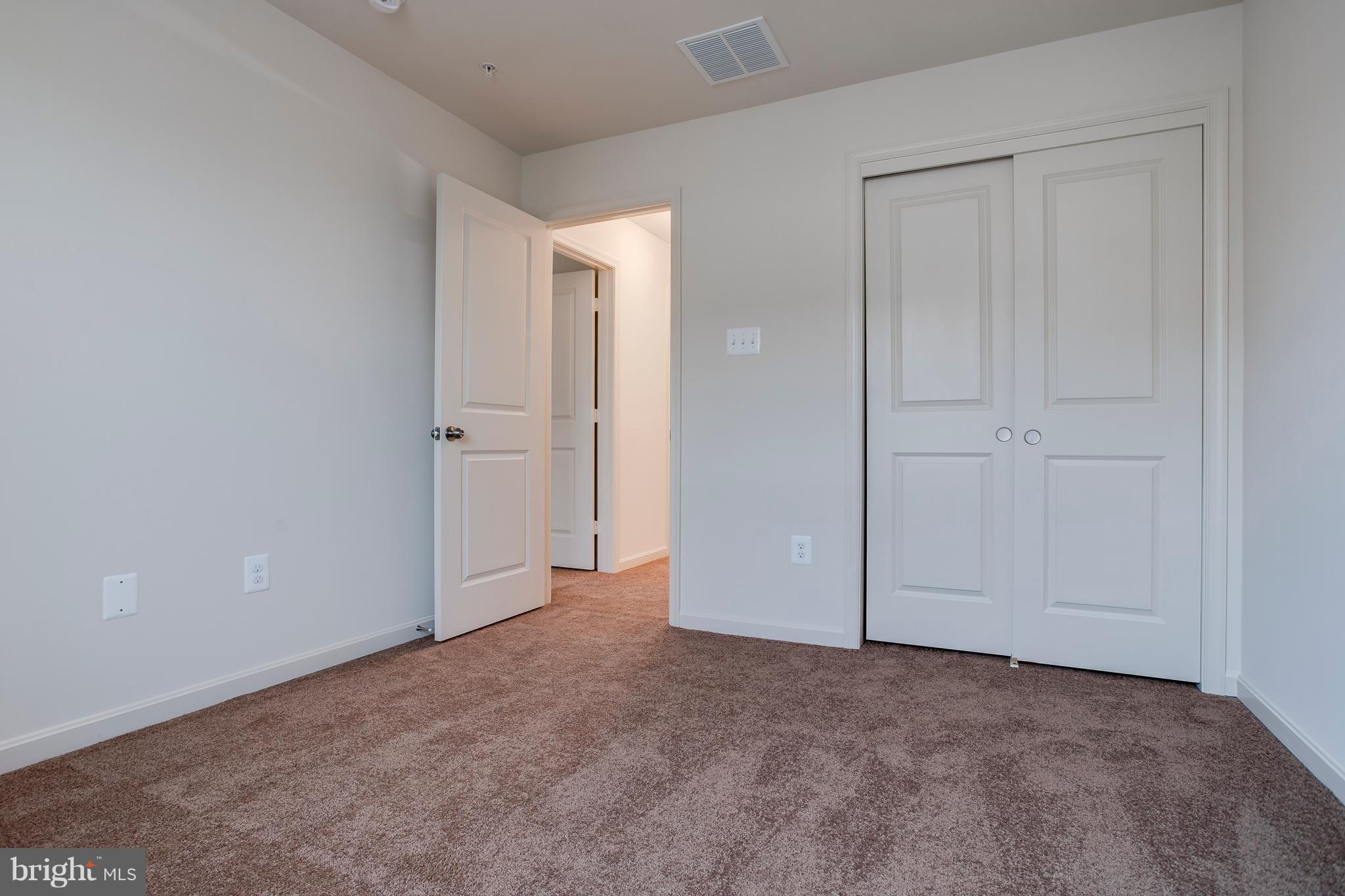 13 Back River Neck Road Baltimore, MD 21221 - Photo 17 of 30 a view of an empty room and closet area