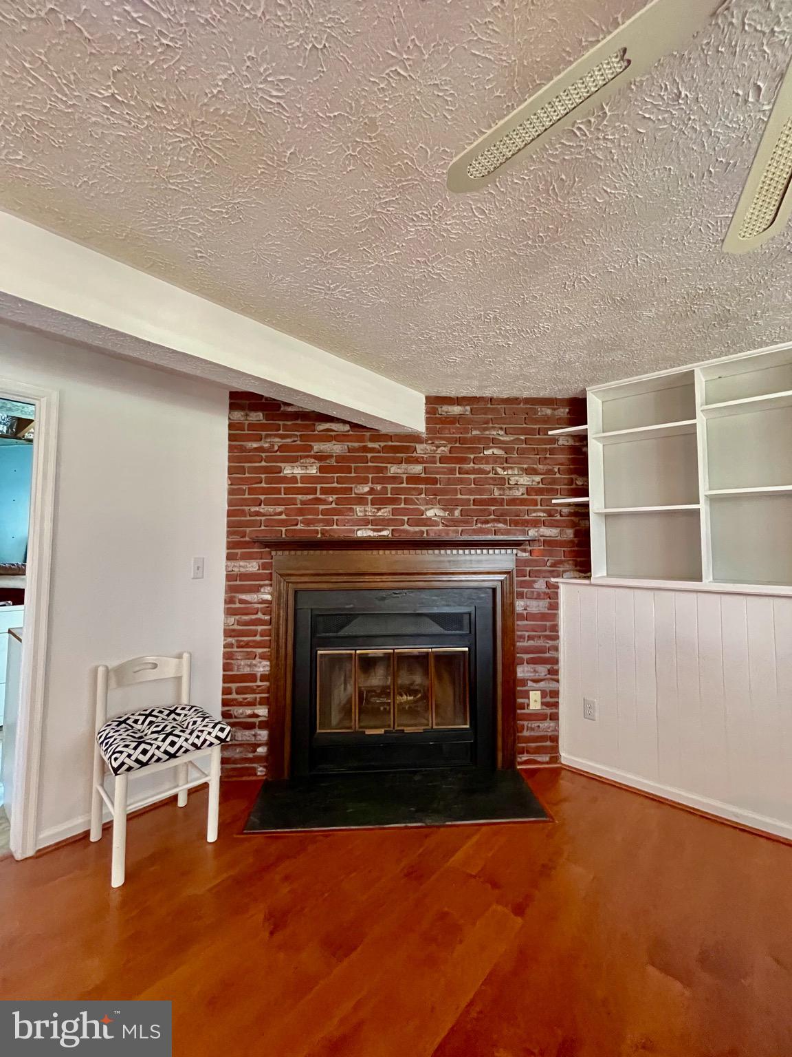 2910 Rockingham Court Pasadena, MD 21122 - Photo 29 of 59 Lower level family room w/wood burning fireplace
