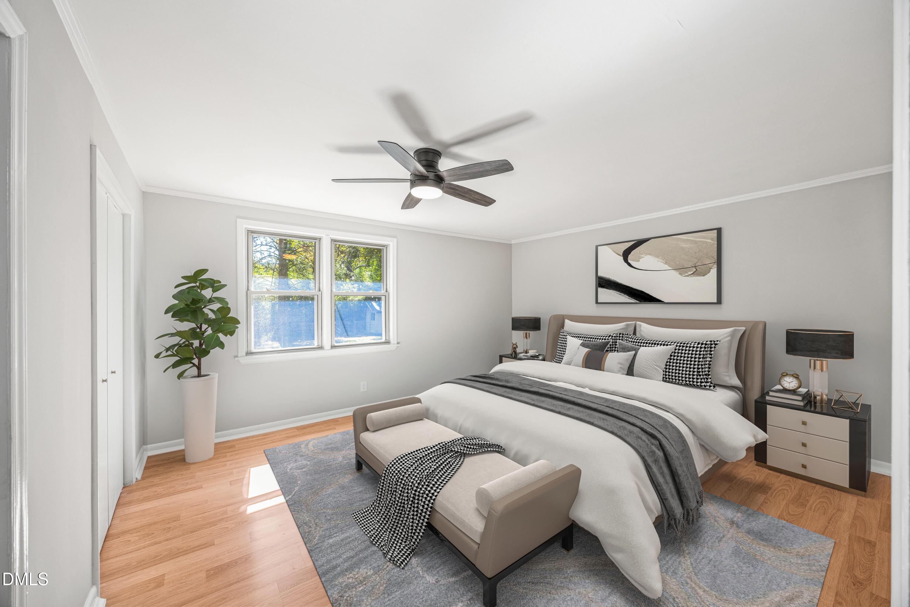 2915 Fawn Avenue Durham, NC 27705 - Photo 21 of 39 a bedroom with bed and a window