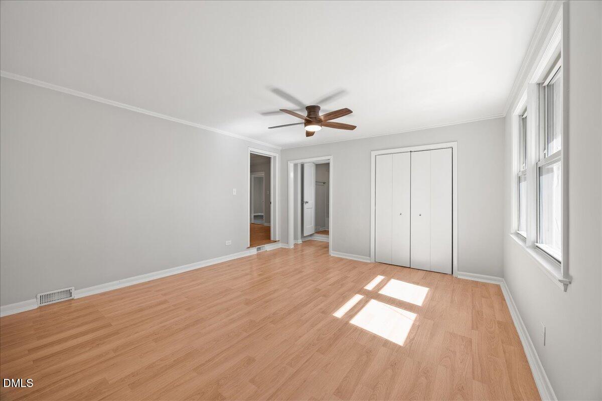 2915 Fawn Avenue Durham, NC 27705 - Photo 22 of 39 wooden floor in an empty room with a window