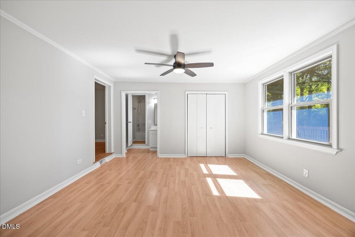 2915 Fawn Avenue Durham, NC 27705 - Photo 23 of 39 a view of empty room with wooden floor and fan