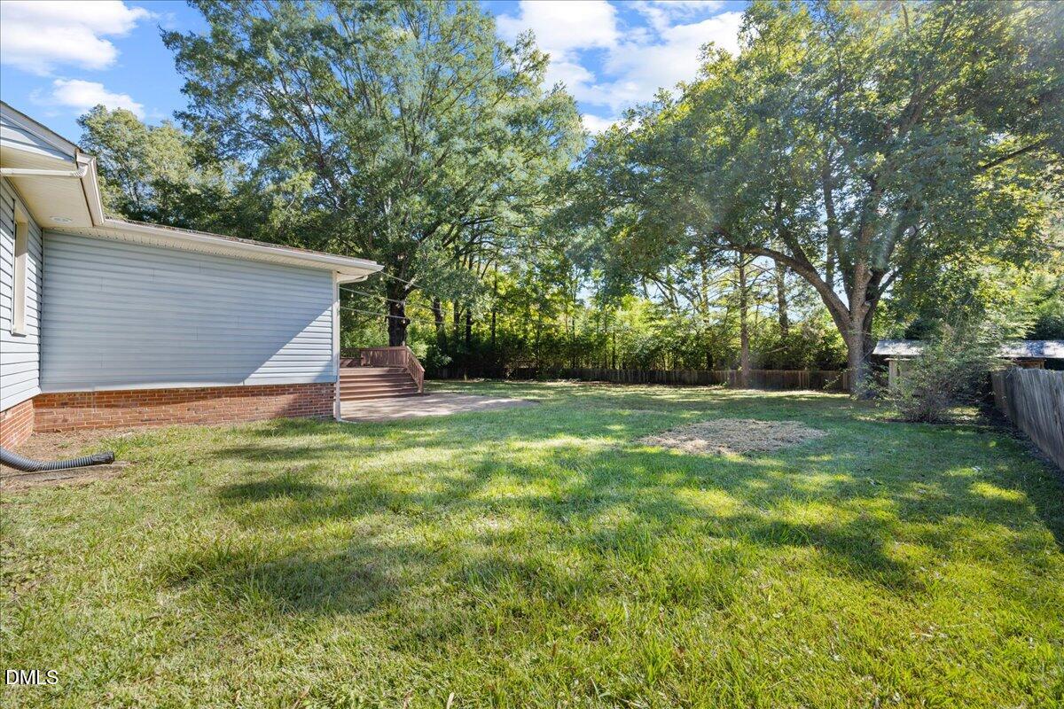 2915 Fawn Avenue Durham, NC 27705 - Photo 32 of 39 a backyard of a house with lots of green space