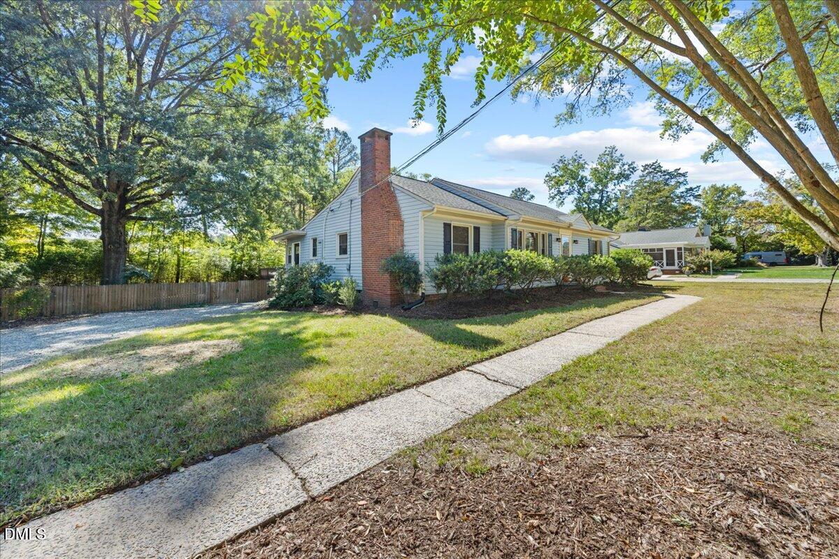 2915 Fawn Avenue Durham, NC 27705 - Photo 3 of 39 a view of a yard with plants and trees