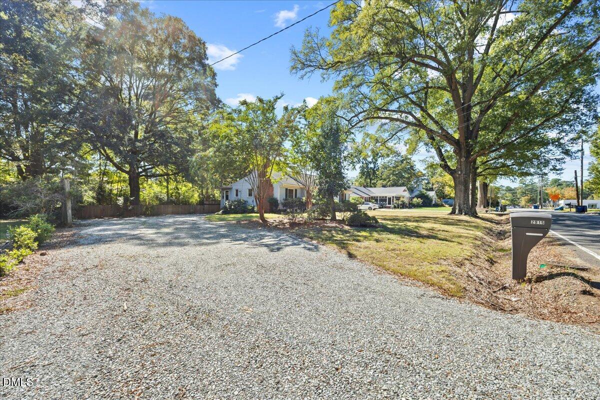 2915 Fawn Avenue Durham, NC 27705 - Photo 4 of 39 a view of road with large trees