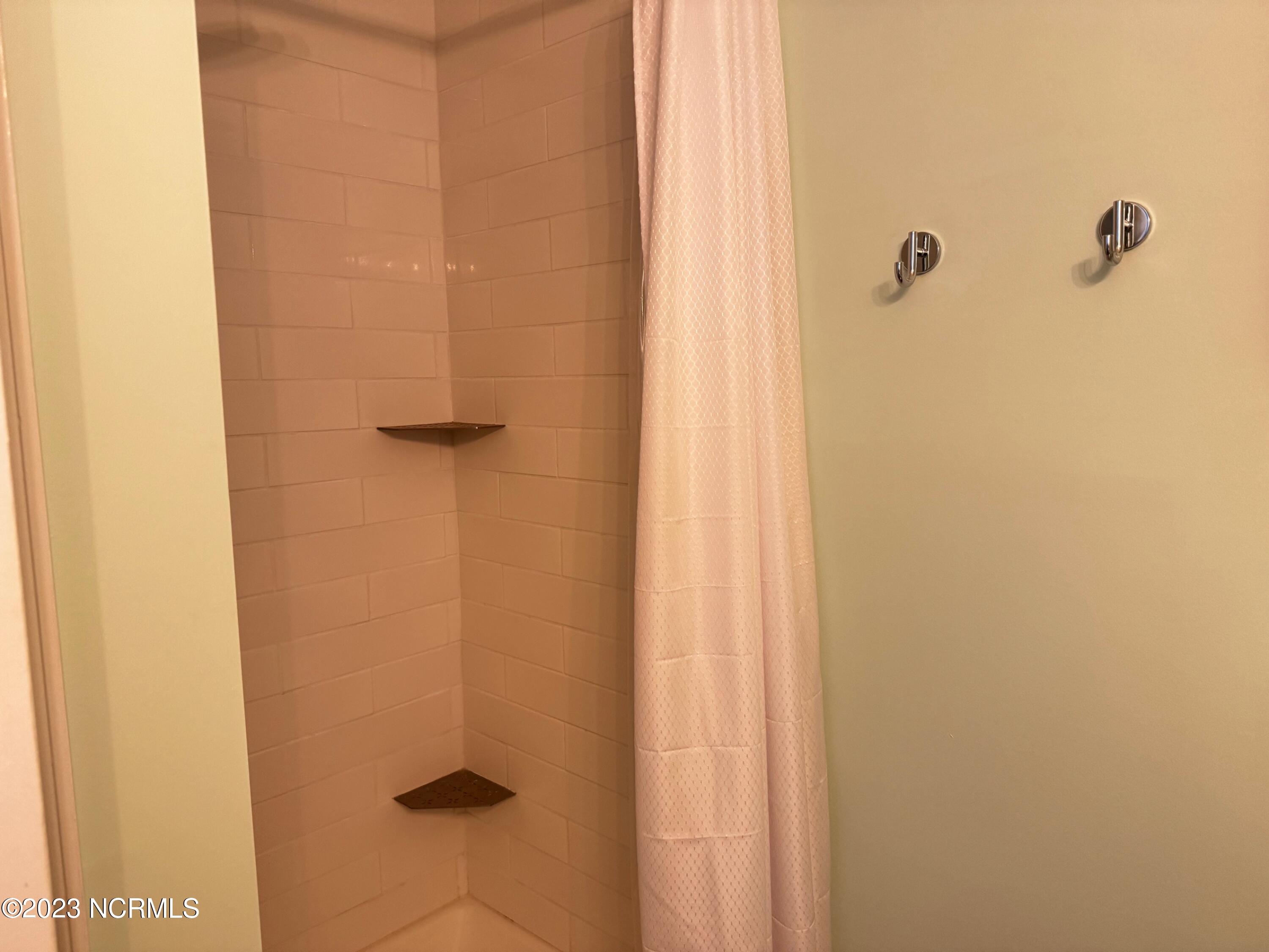 790 New River Inlet Road, Unit 416B North Topsail Beach, NC 28460 - Photo 25 of 35 Master bath shower