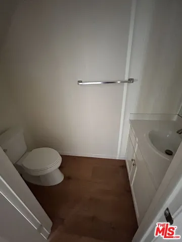 a bathroom with a toilet and a sink