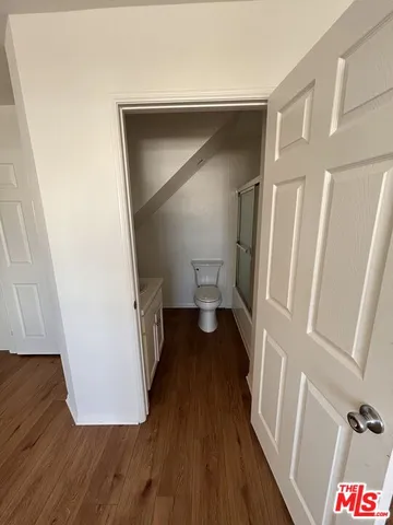 a view of entryway with wooden floor