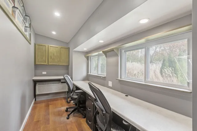 a room with gym equipment and a window