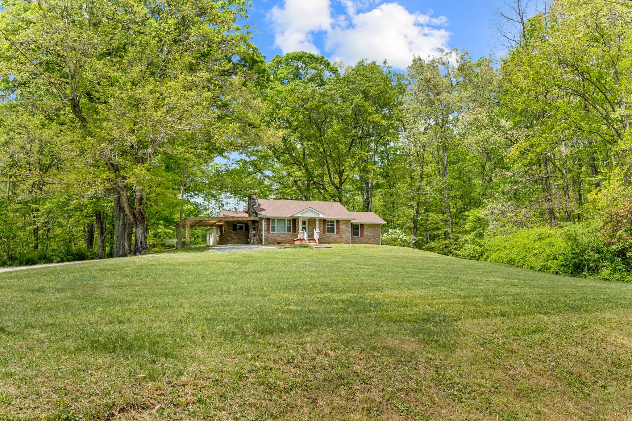 5116 Denmark Road Erin, TN 37061 - Photo 55 of 55 a front view of a house with a garden