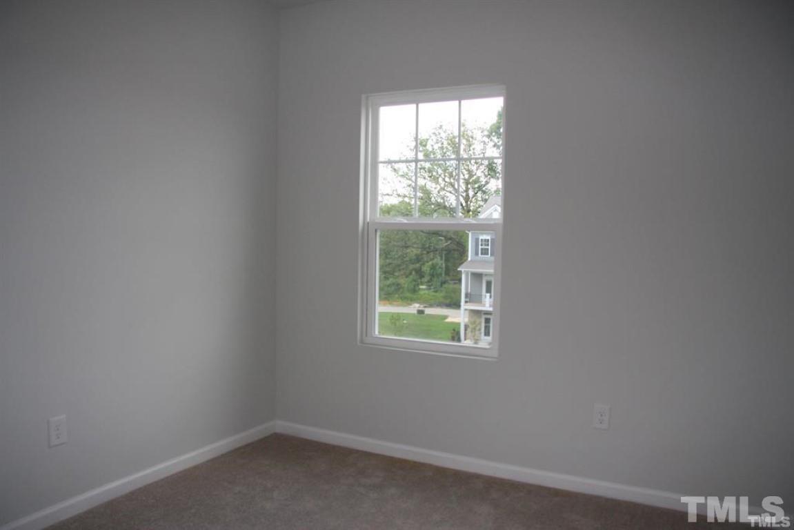 2919 Sunflower Road Apex, NC 27502 - Photo 26 of 34 an empty room with a window