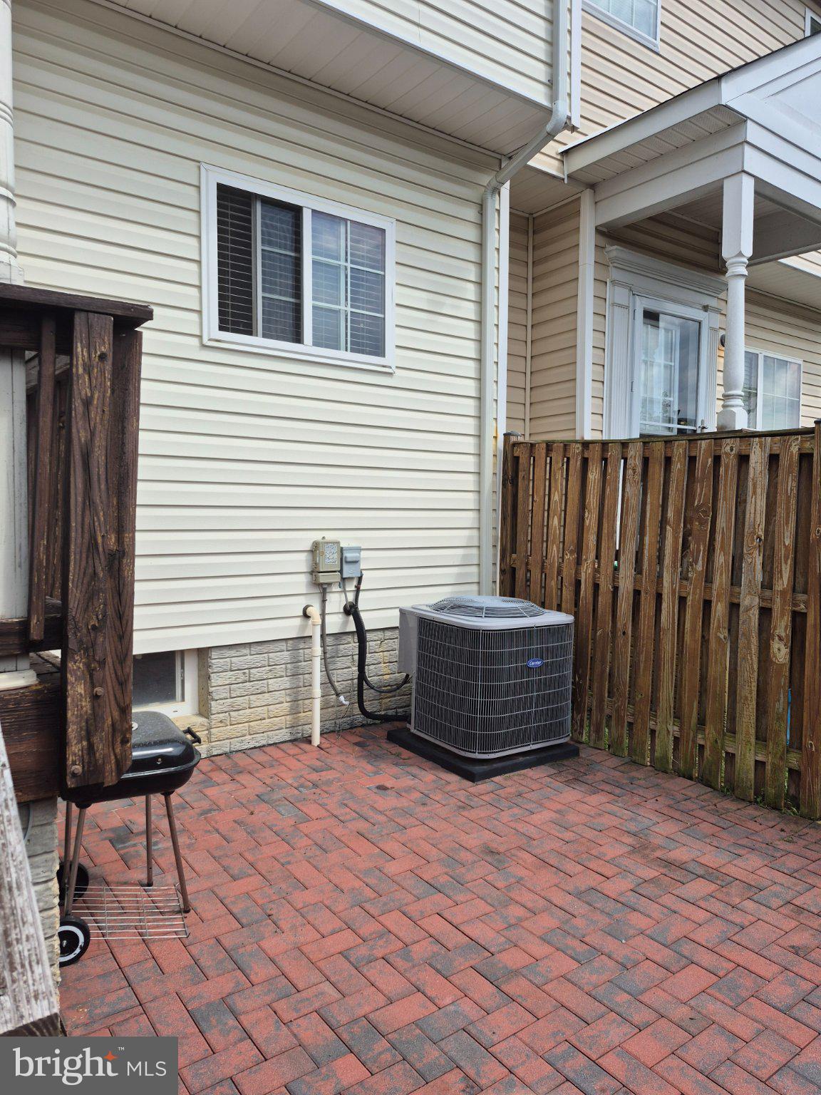 15411 Wylie Road Brandywine, MD 20613 - Photo 36 of 38 Charming patio with brick pavers.