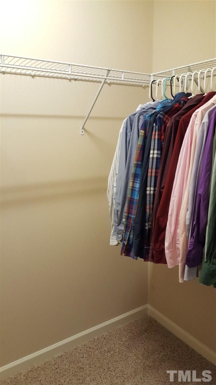 408 Stone Flower Lane Raleigh, NC 27603 - Photo 10 of 20 Closet in master bedroom measures approximately 7' by 3.5'