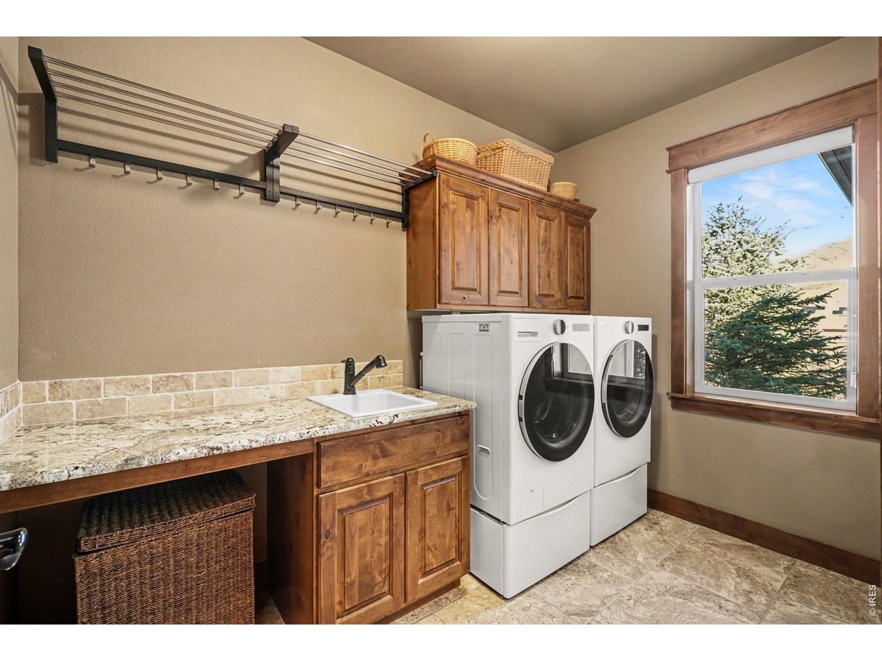 10723 Buckhorn Ridge Way Loveland, CO 80538 - Photo 24 of 50 a utility room with dryer and washer