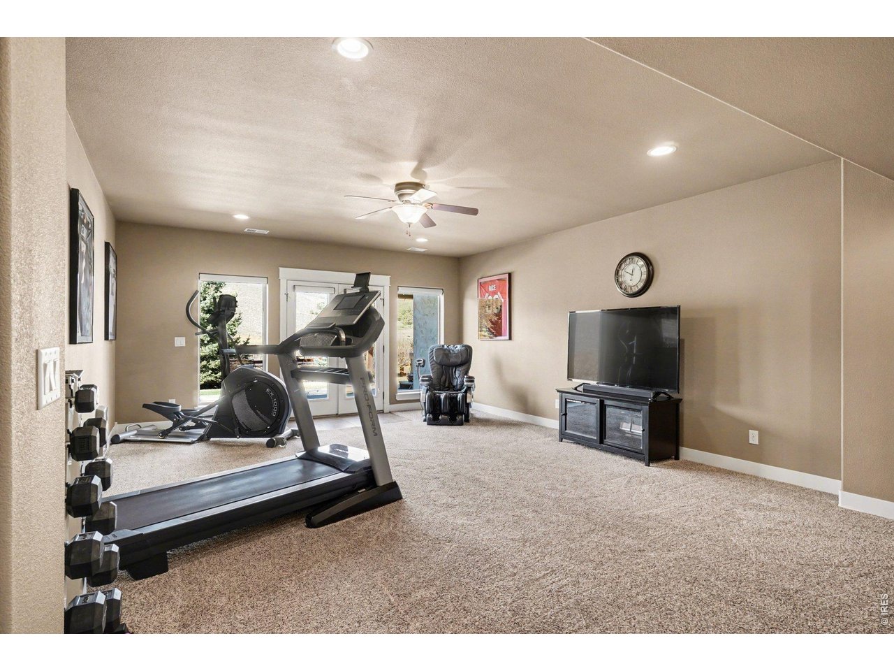 10723 Buckhorn Ridge Way Loveland, CO 80538 - Photo 27 of 50 a view of a room with gym equipment