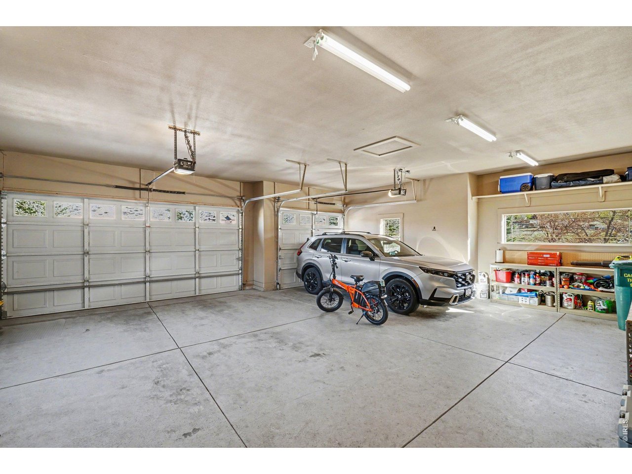 10723 Buckhorn Ridge Way Loveland, CO 80538 - Photo 34 of 50 a view of parking garage with cars