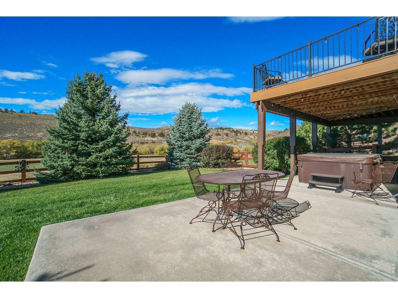 10723 Buckhorn Ridge Way Loveland, CO 80538 - Photo 38 of 50 a view of a backyard with sitting area