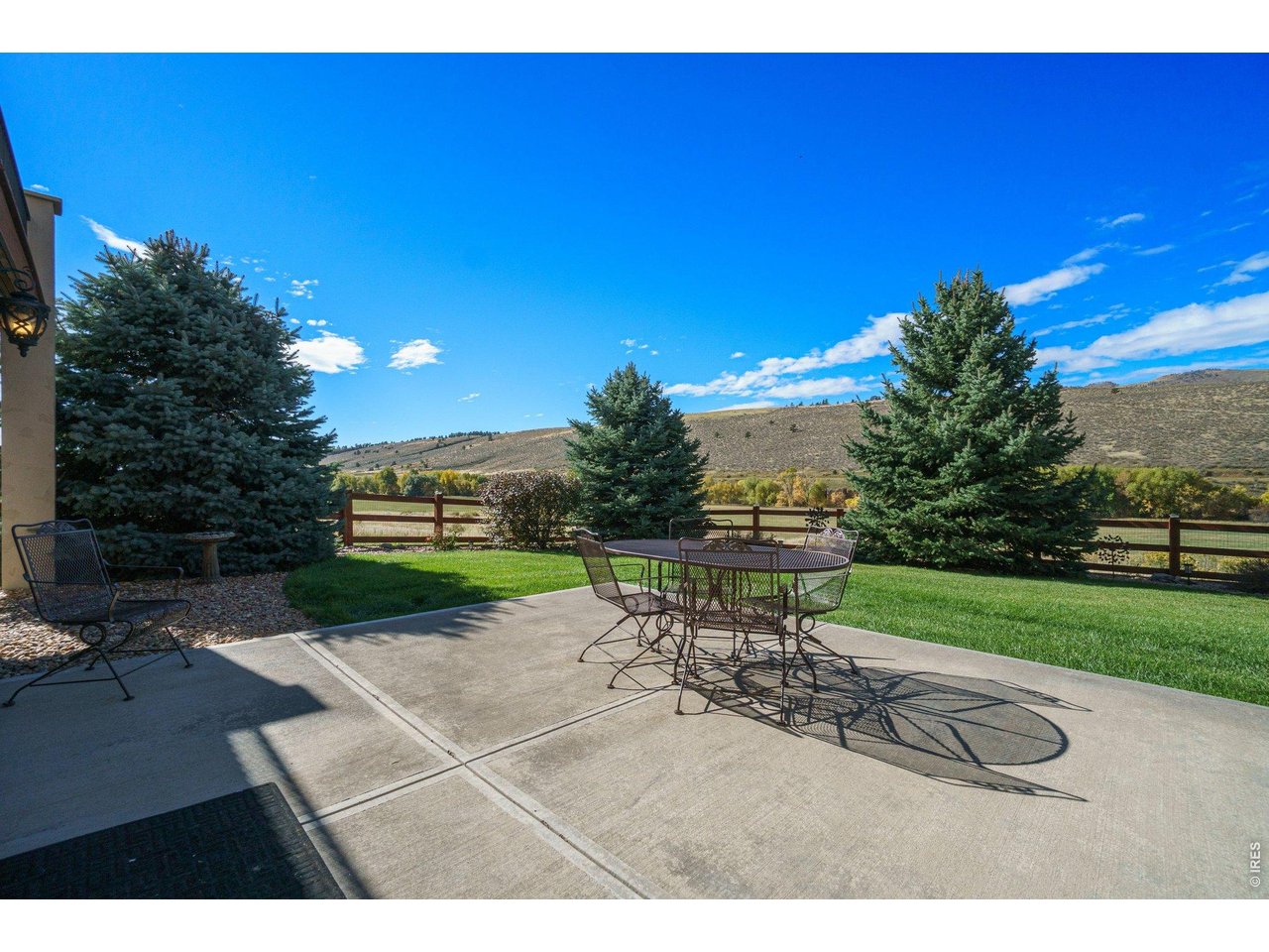 10723 Buckhorn Ridge Way Loveland, CO 80538 - Photo 39 of 50 a view of a backyard with sitting area