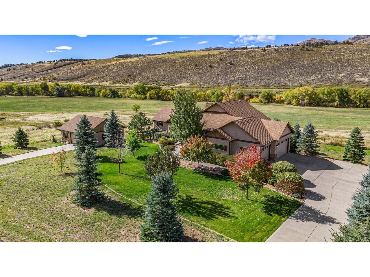 10723 Buckhorn Ridge Way Loveland, CO 80538 - Photo 41 of 50 a view of lake with mountain