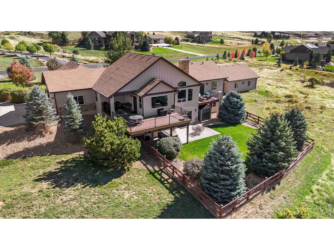 10723 Buckhorn Ridge Way Loveland, CO 80538 - Photo 43 of 50 a aerial view of a house with garden