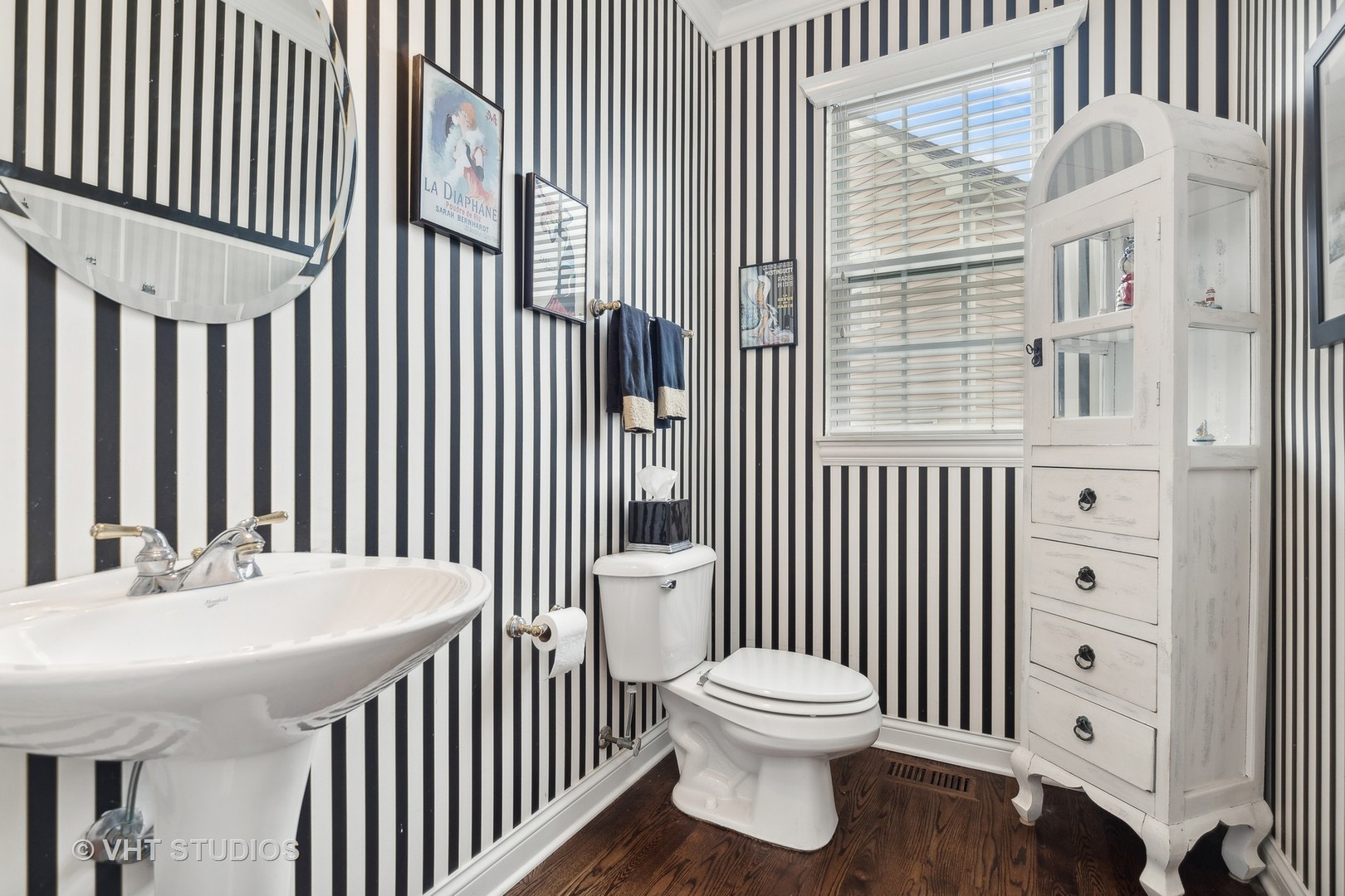 303 Saddle Lane Fox River Grove, IL 60021 - Photo 17 of 70 a bathroom with a sink and a mirror