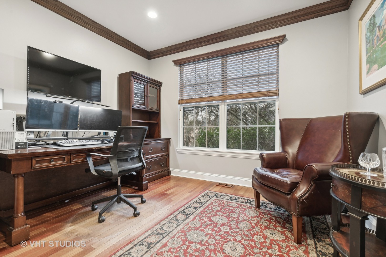 303 Saddle Lane Fox River Grove, IL 60021 - Photo 18 of 70 a work room with furniture wooden floor and windows