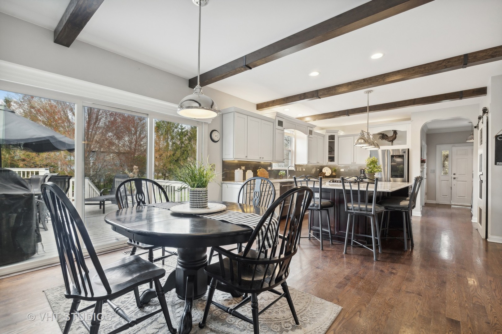 303 Saddle Lane Fox River Grove, IL 60021 - Photo 23 of 70 a view of a dining room with furniture window and outside view