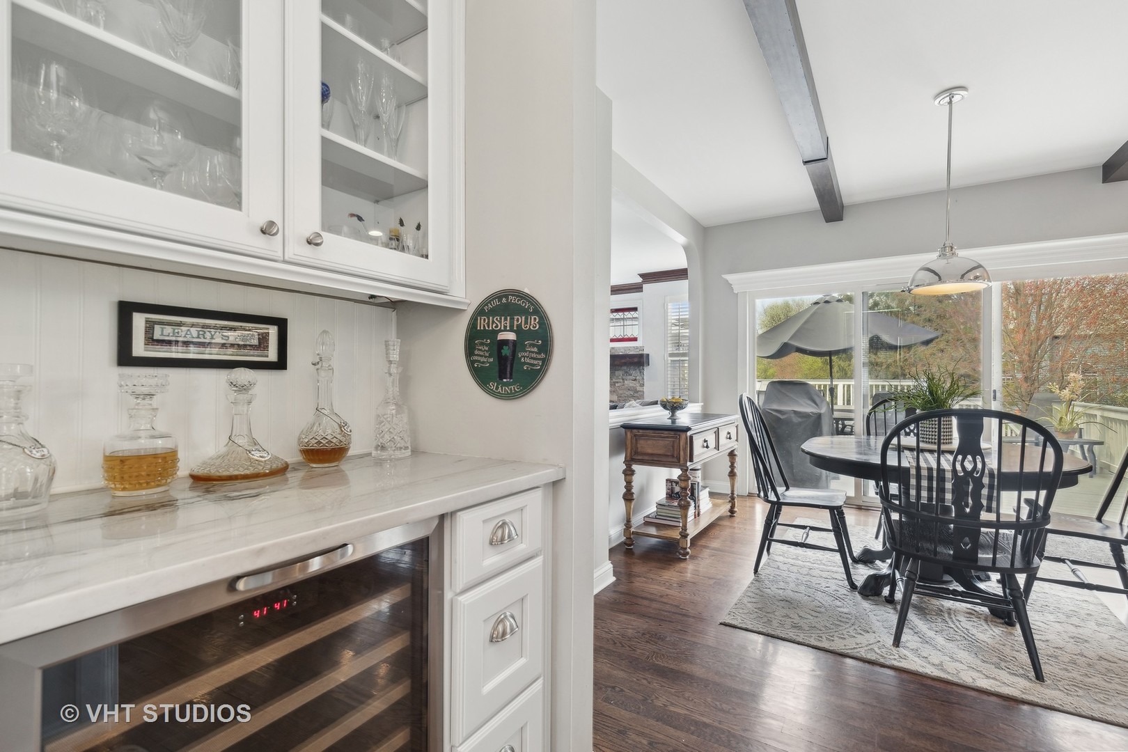 303 Saddle Lane Fox River Grove, IL 60021 - Photo 29 of 70 a kitchen with a table chairs and a stove