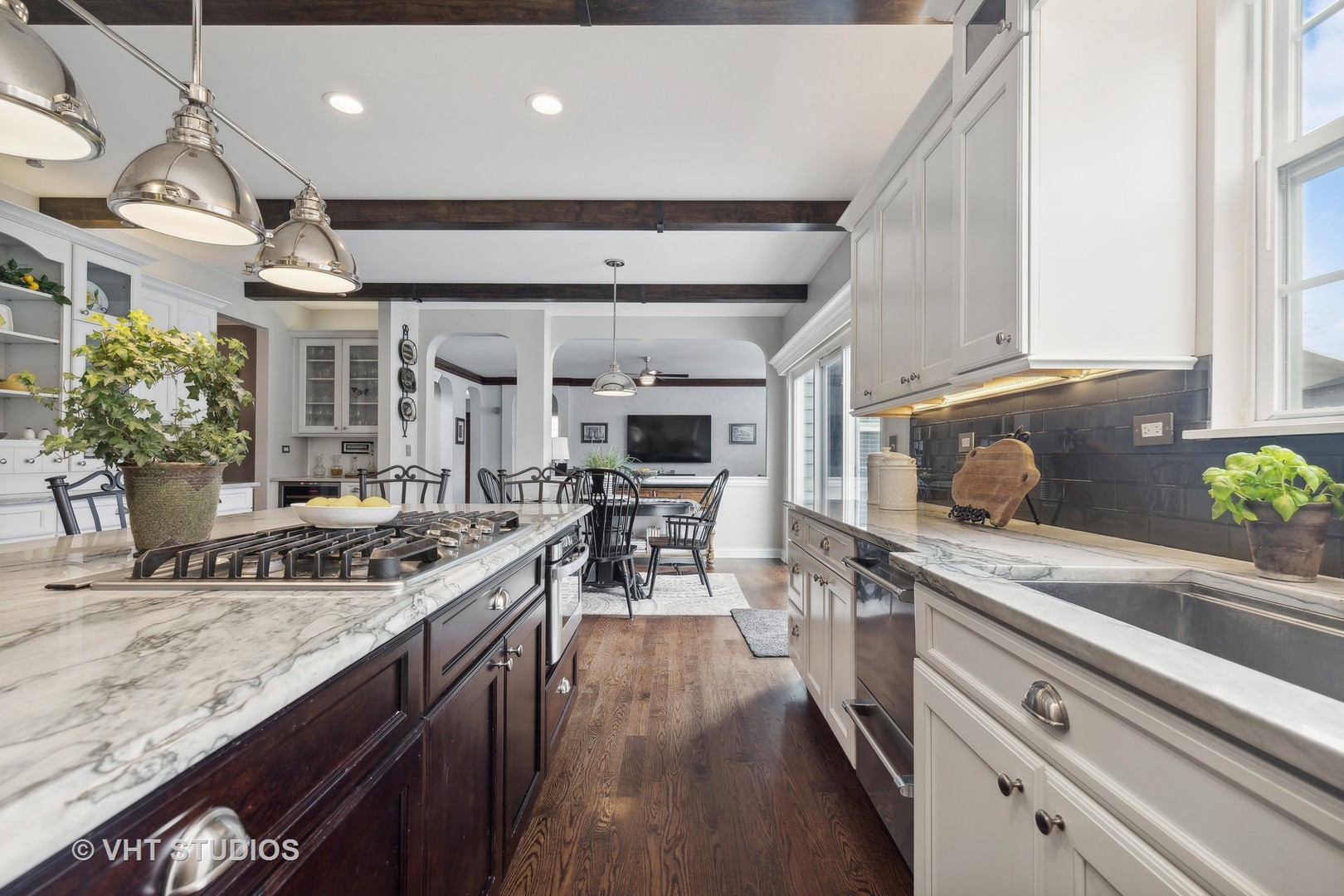 303 Saddle Lane Fox River Grove, IL 60021 - Photo 32 of 70 a kitchen with stainless steel appliances granite countertop a sink a stove and a wooden floors